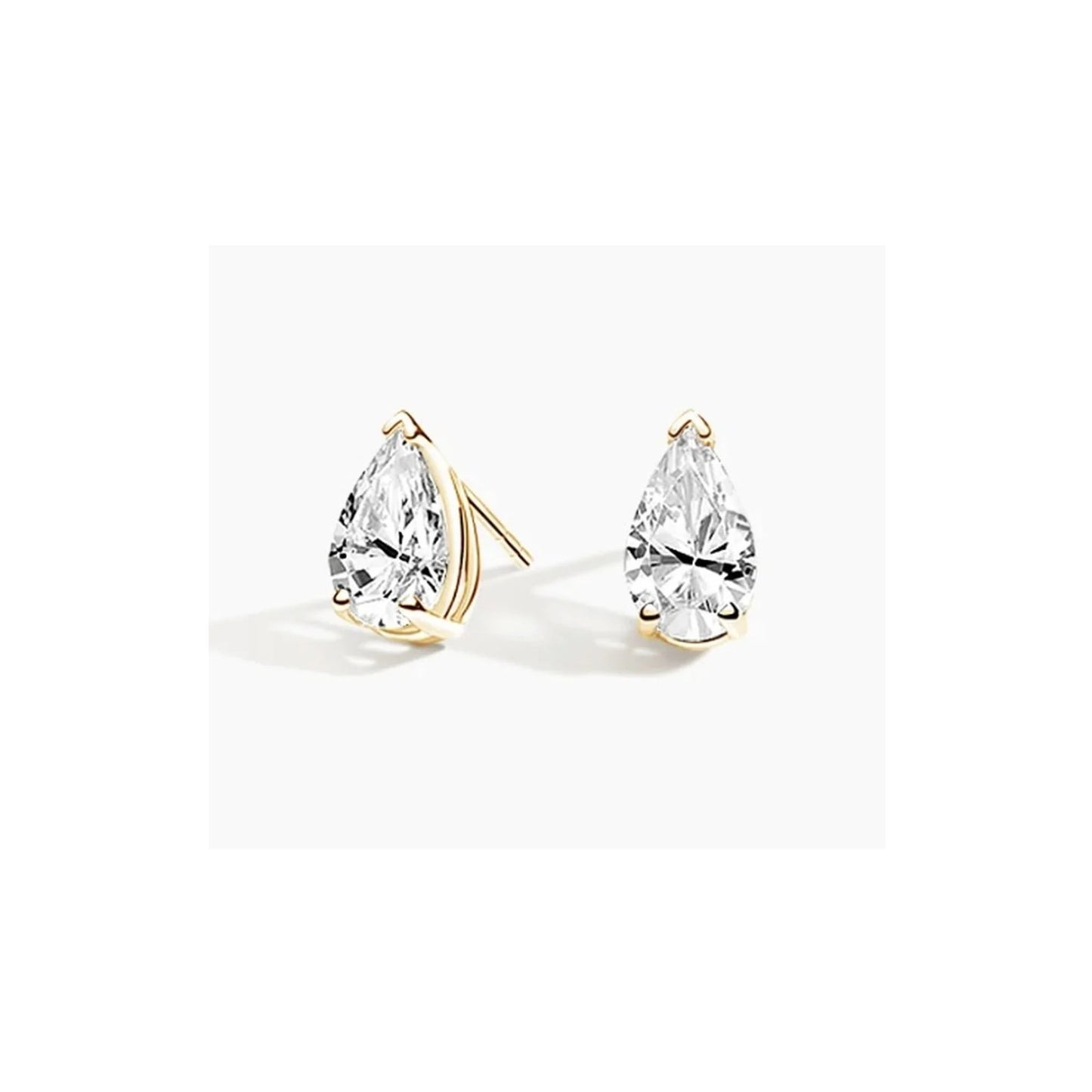 Classic pear diamond studs 0.80ct lab created 14K gold minimalist fine jewelry studio photography