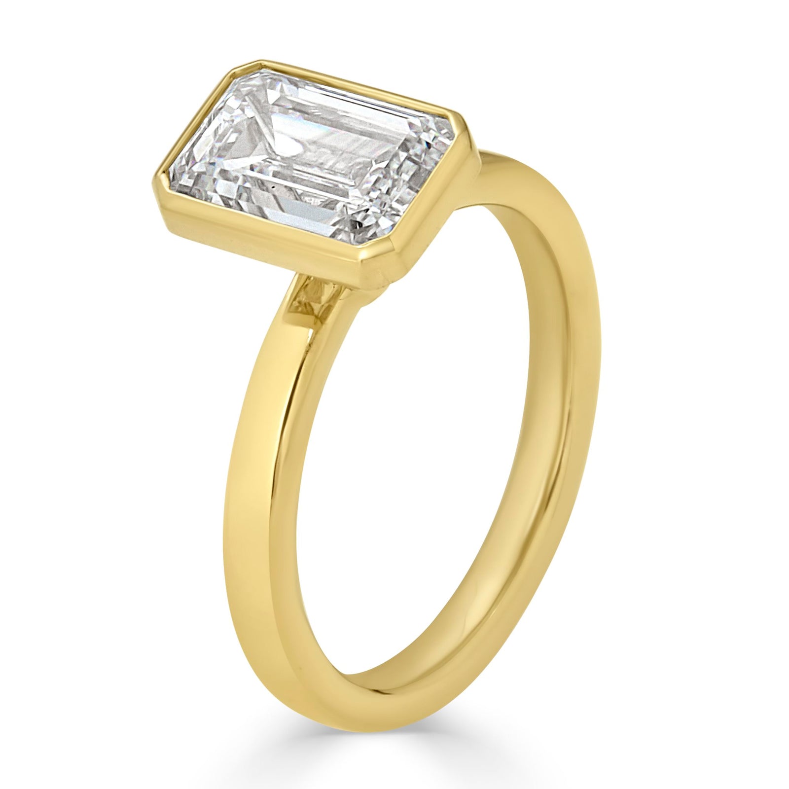 Noura Emerald Cut Bezel Set Engagement Ring