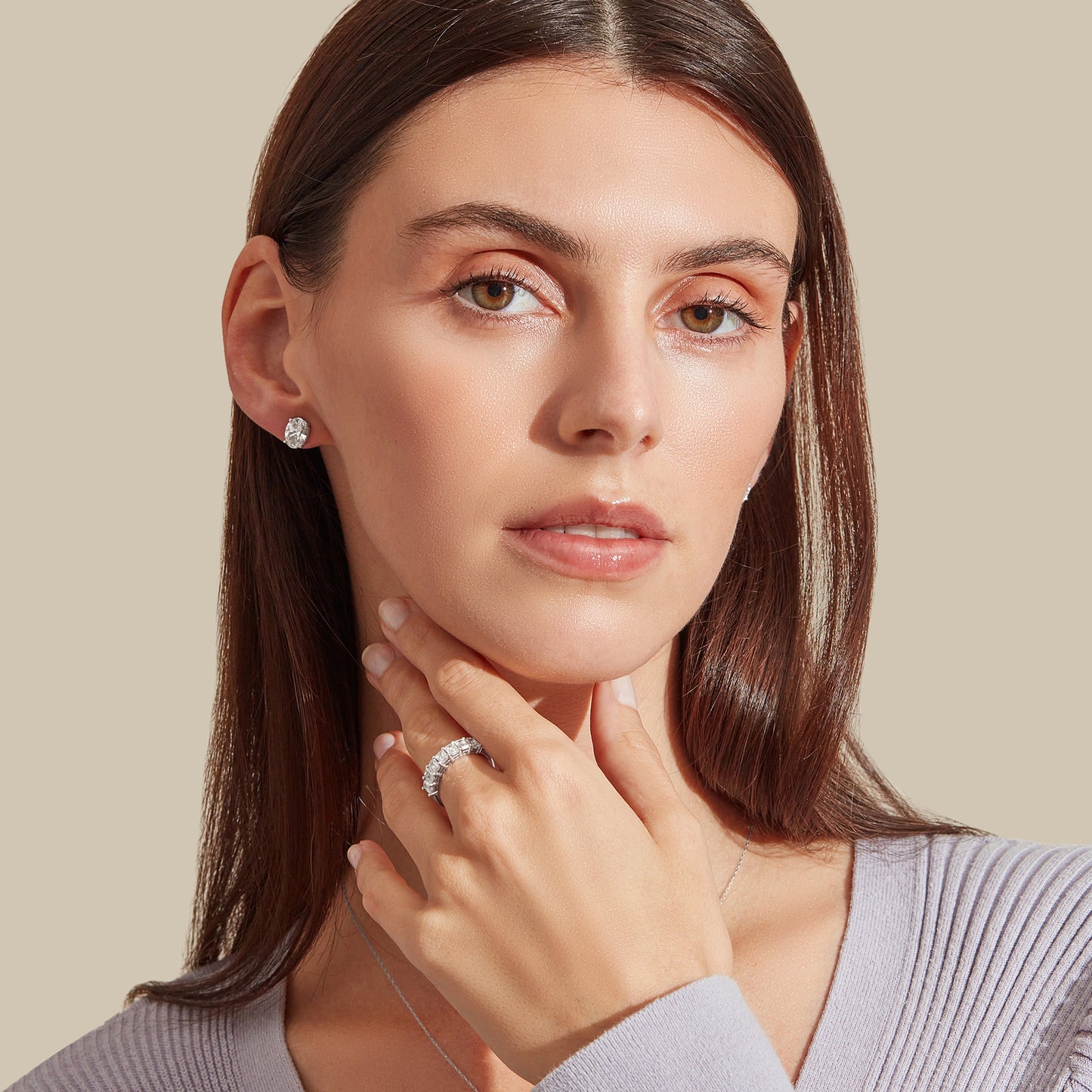 Lumeniri Classic Oval Stud Earrings worn, showcasing 2cttw of IGI-certified lab-grown diamonds in 14K White Gold for a sophisticated, modern look.
