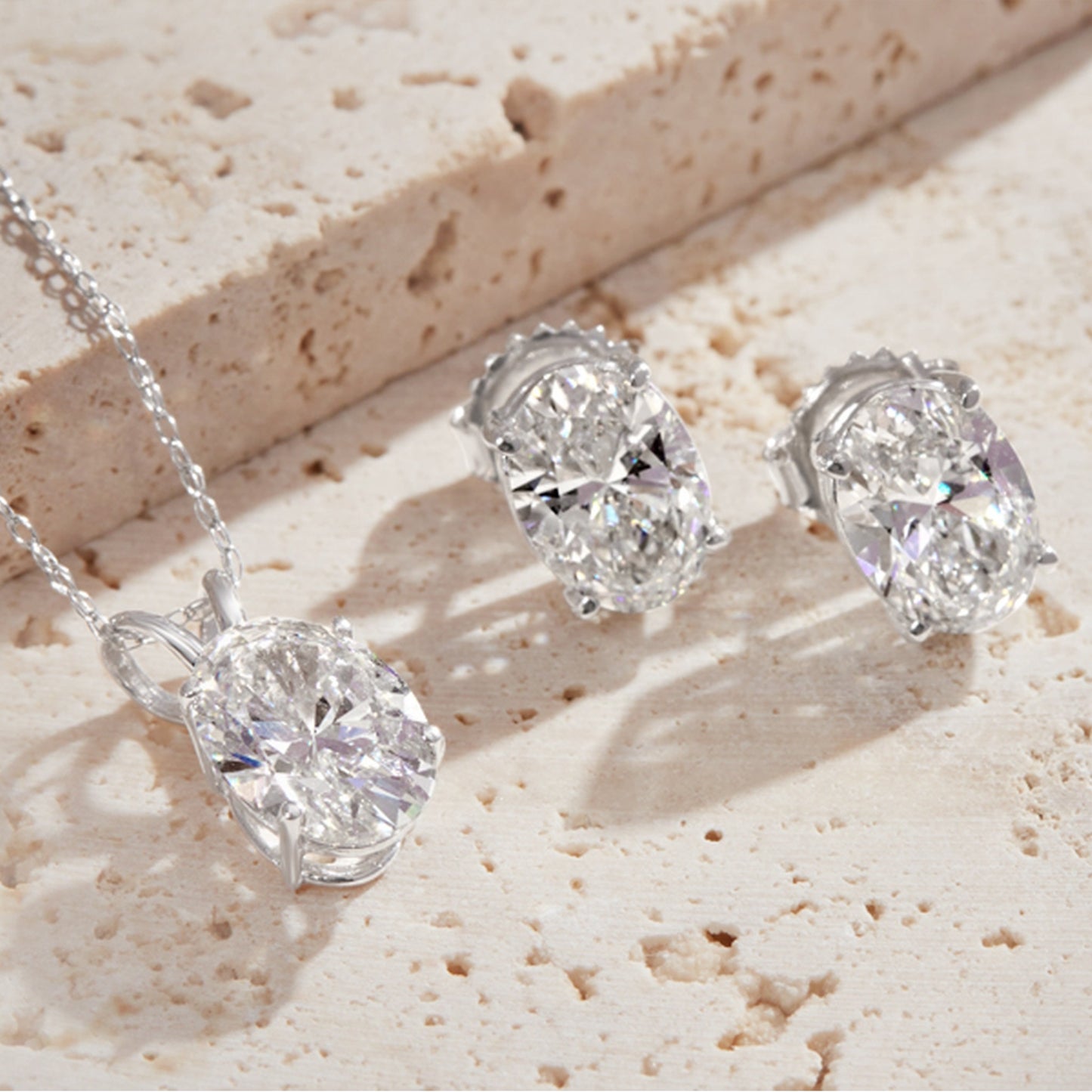 Lumeniri Diamonds Classic Oval Stud Earrings with IGI-certified F color diamonds in a 14K White Gold setting, displayed on a white background for maximum clarity and sophistication.