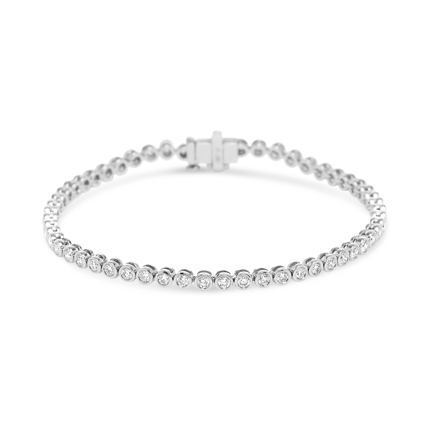Lumeniri Lucia bezel set tennis bracelet showcasing 2 carats of round lab grown diamonds in modern 14K white gold design on white background.