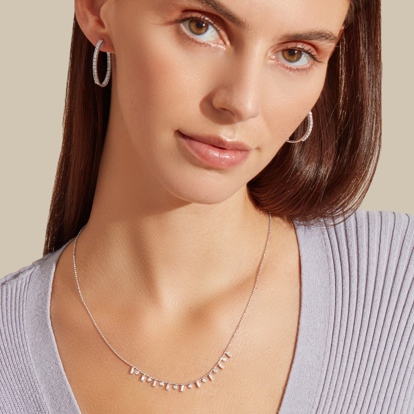 Lumeniri Lumeniri Elinor hoops styled on model, highlighting bold 2ct diamond sparkle in 14K gold timeless luxury everyday wear.