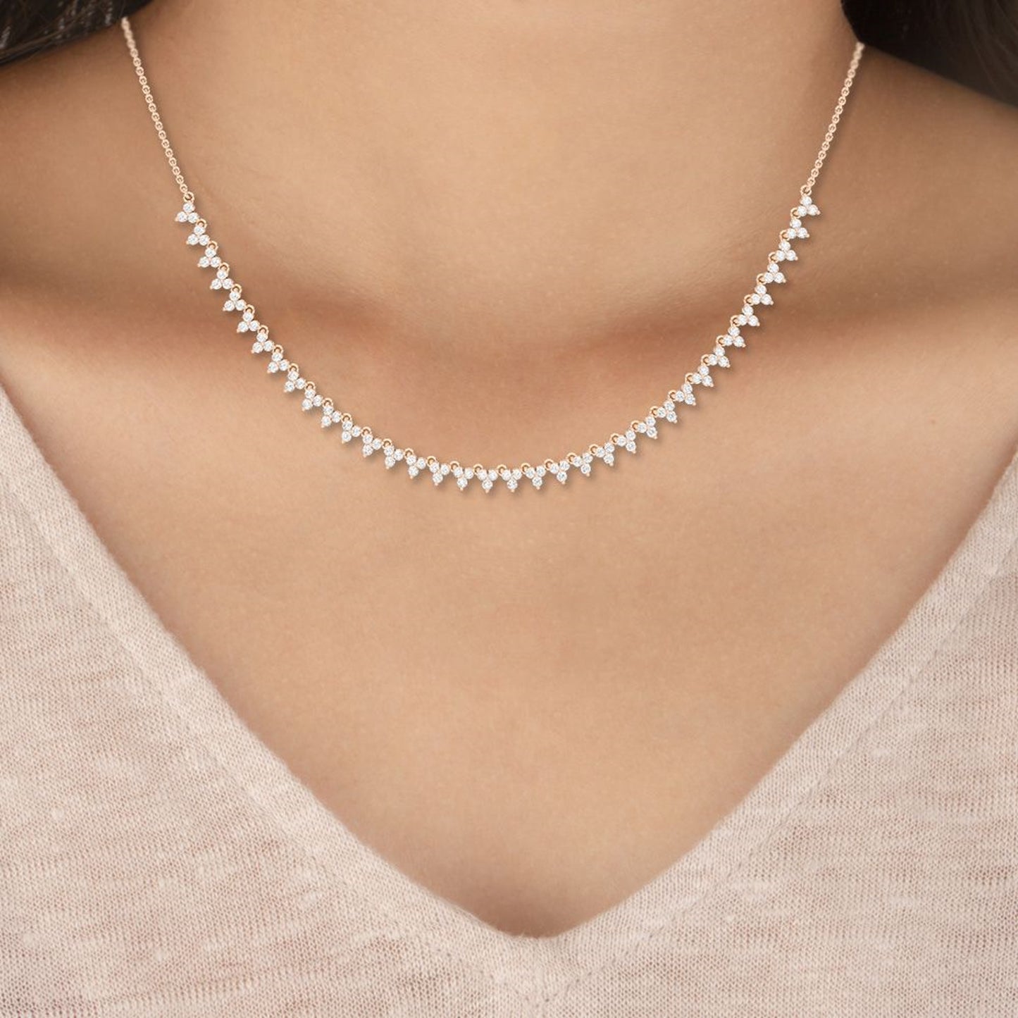 Lumeniri The Kelli Trilogy Necklace worn on neck, showcasing 2.35ct lab grown diamonds in elegant 14K gold modern layered fine jewelry styling.