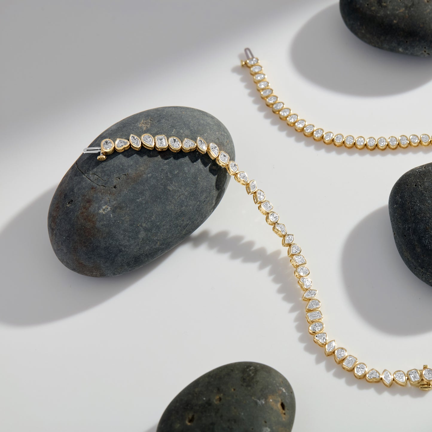 Lumeniri The Lucia North South Mixed Fancy Shape Tennis Bracelet worn on wrist, showcasing 11.31ctw lab grown diamonds in bezel set 14K gold modern luxury fine jewelry styling.