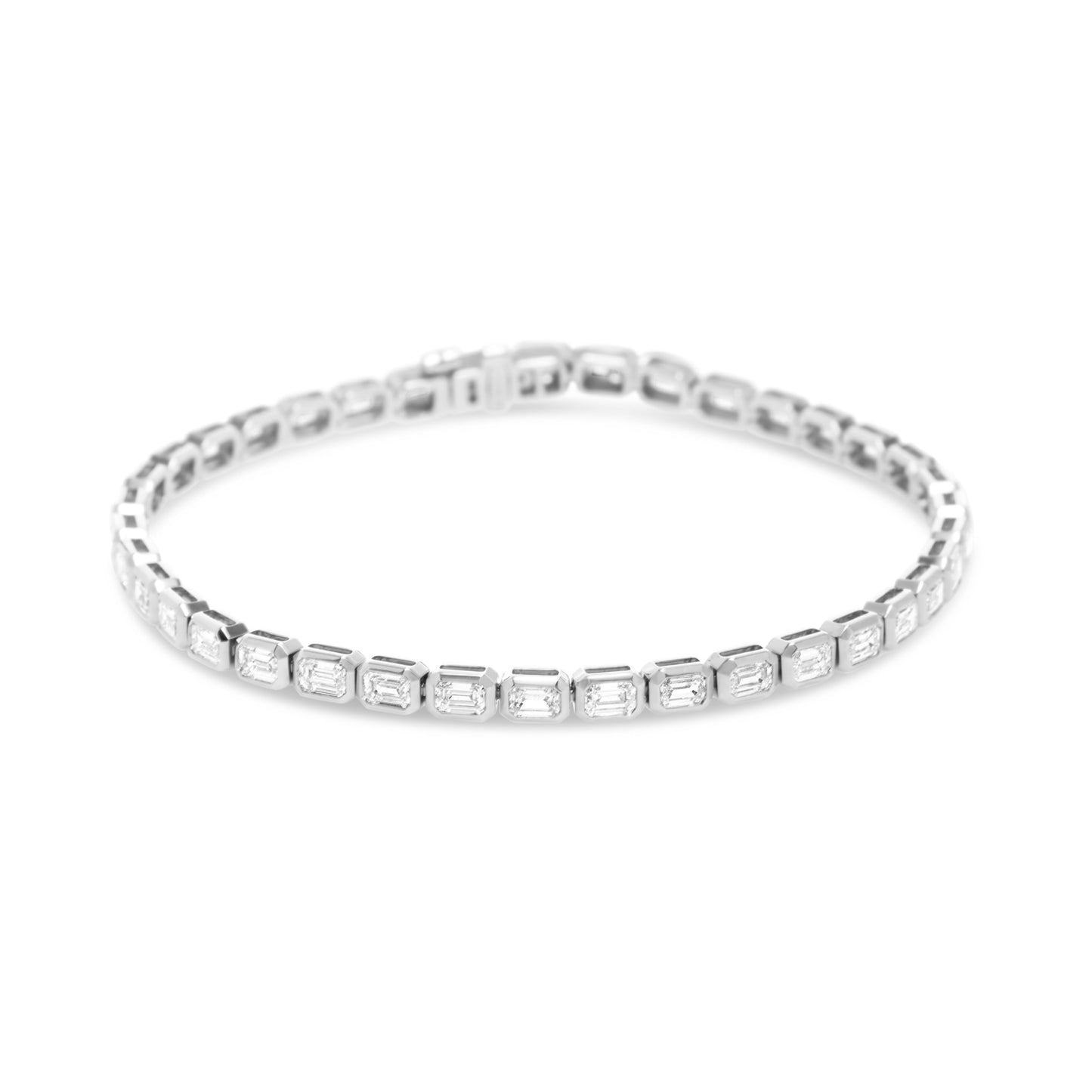 Lumeniri The Lucia emerald cut bracelet showcasing horizontal east-west lab grown diamonds, 4.82ct total weight in sleek bezel set 14K white gold design on white background.