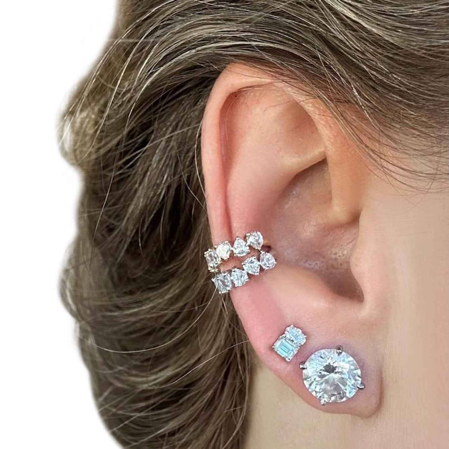 Lumeniri The Sabine Cuff Culture Earcuff worn on ear, featuring round brilliant lab grown diamonds in a sculptural 9mm 14K gold design, modern stackable genderless fine jewelry styling.