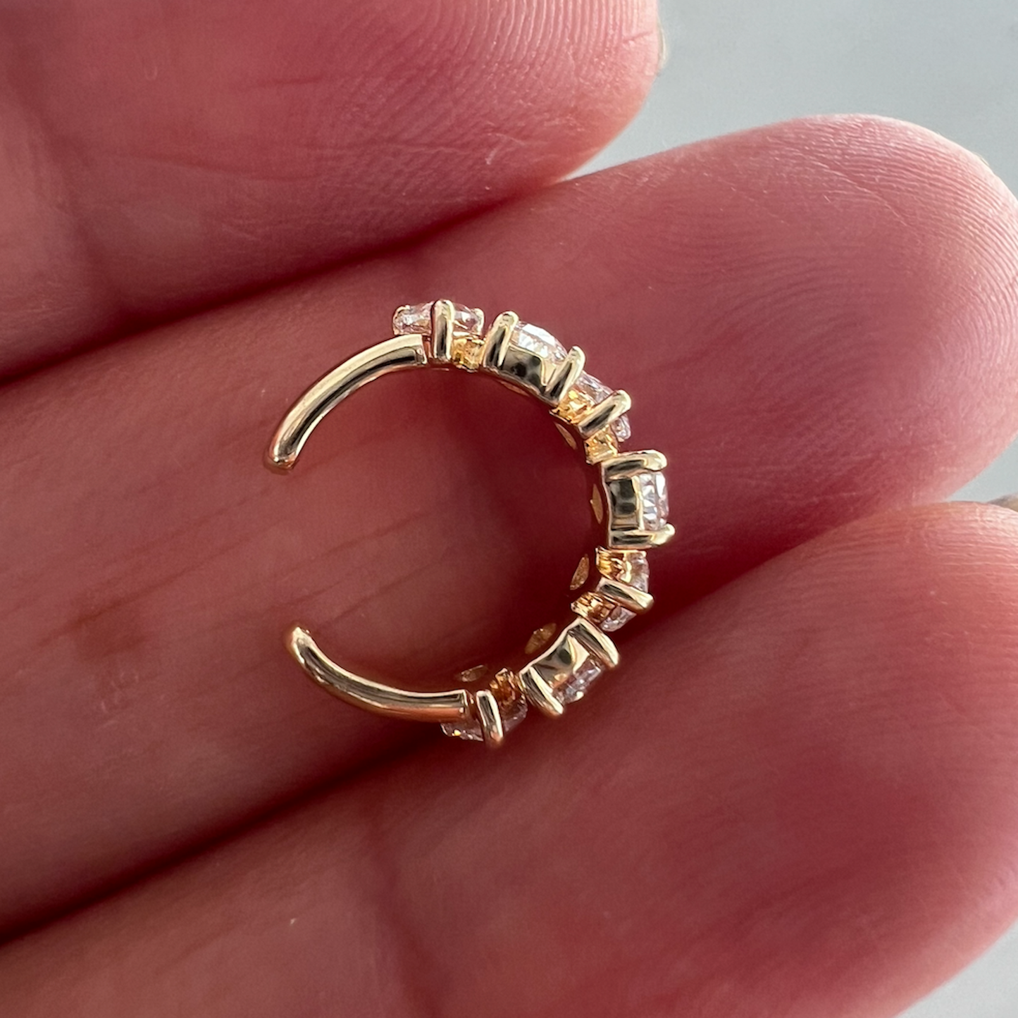 Lumeniri The Sabine Round Diamond Earcuff styled on ear, highlighting 0.60ctw lab grown diamonds in a refined 9mm 14K gold cuff, effortless everyday luxury jewelry look.