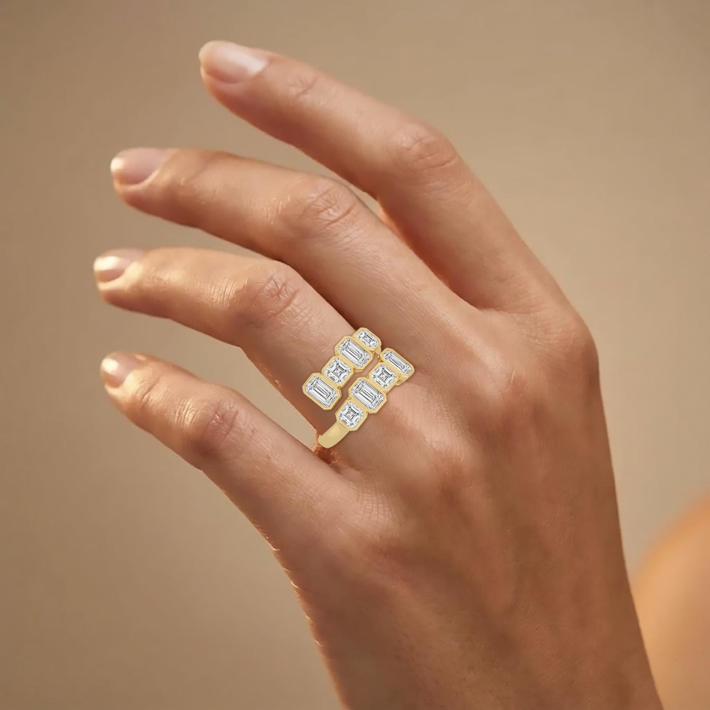 Modern Lumeniri Mariela ring with 3.38 ctw emerald and Asscher lab grown diamonds in 14K yellow gold wrap design