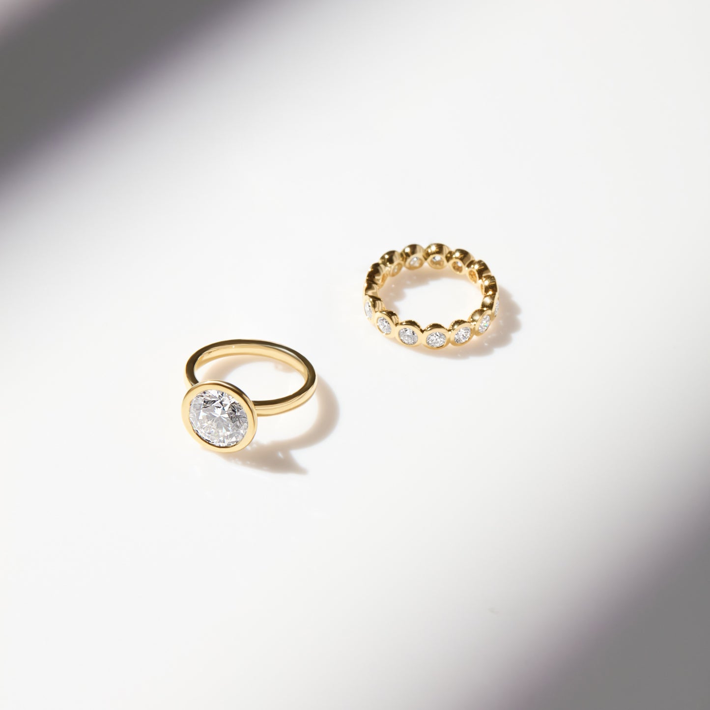 The Nova Eternity Band by Lumeniri with 2.00 CTW round diamonds in a sleek single-level bezel setting.