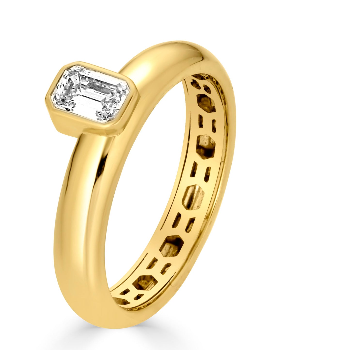 The Nadia Offset Emerald Cut Bezel Set Band by Lumeniri, featuring a 0.5ct lab-grown emerald-cut diamond set in 14K yellow gold with a modern offset design, shown on a white background.
