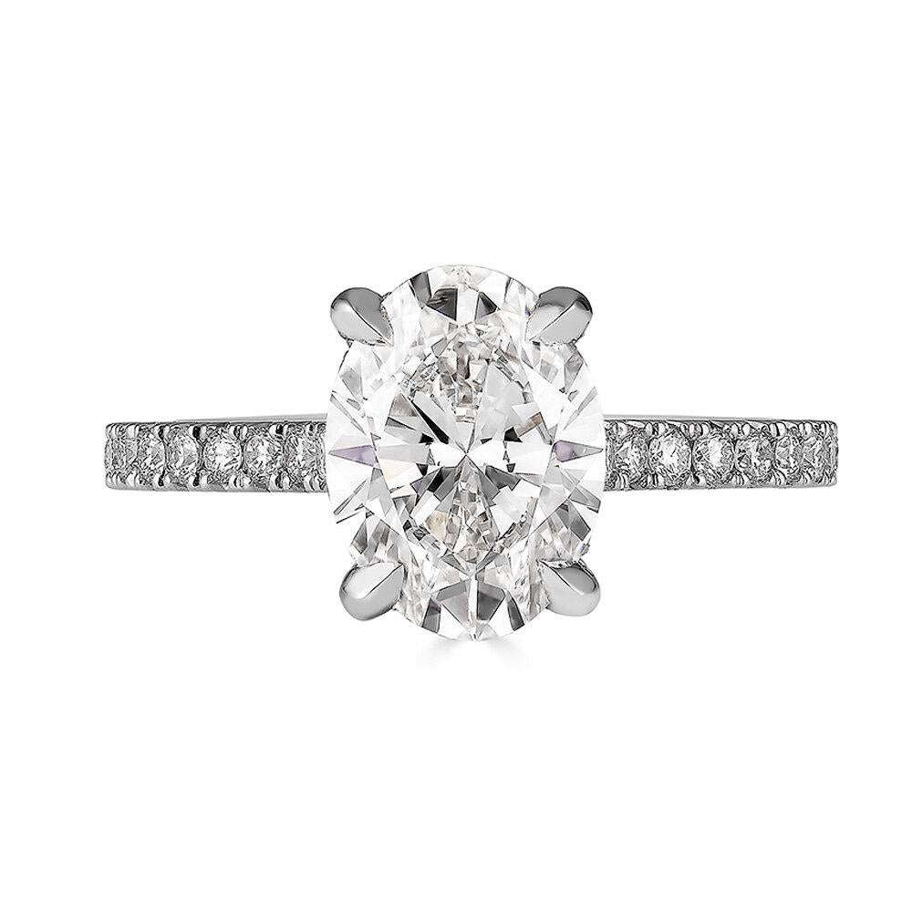 Oval-cut lab-grown diamond at the center of the Soleil Hidden Halo Solitaire Ring